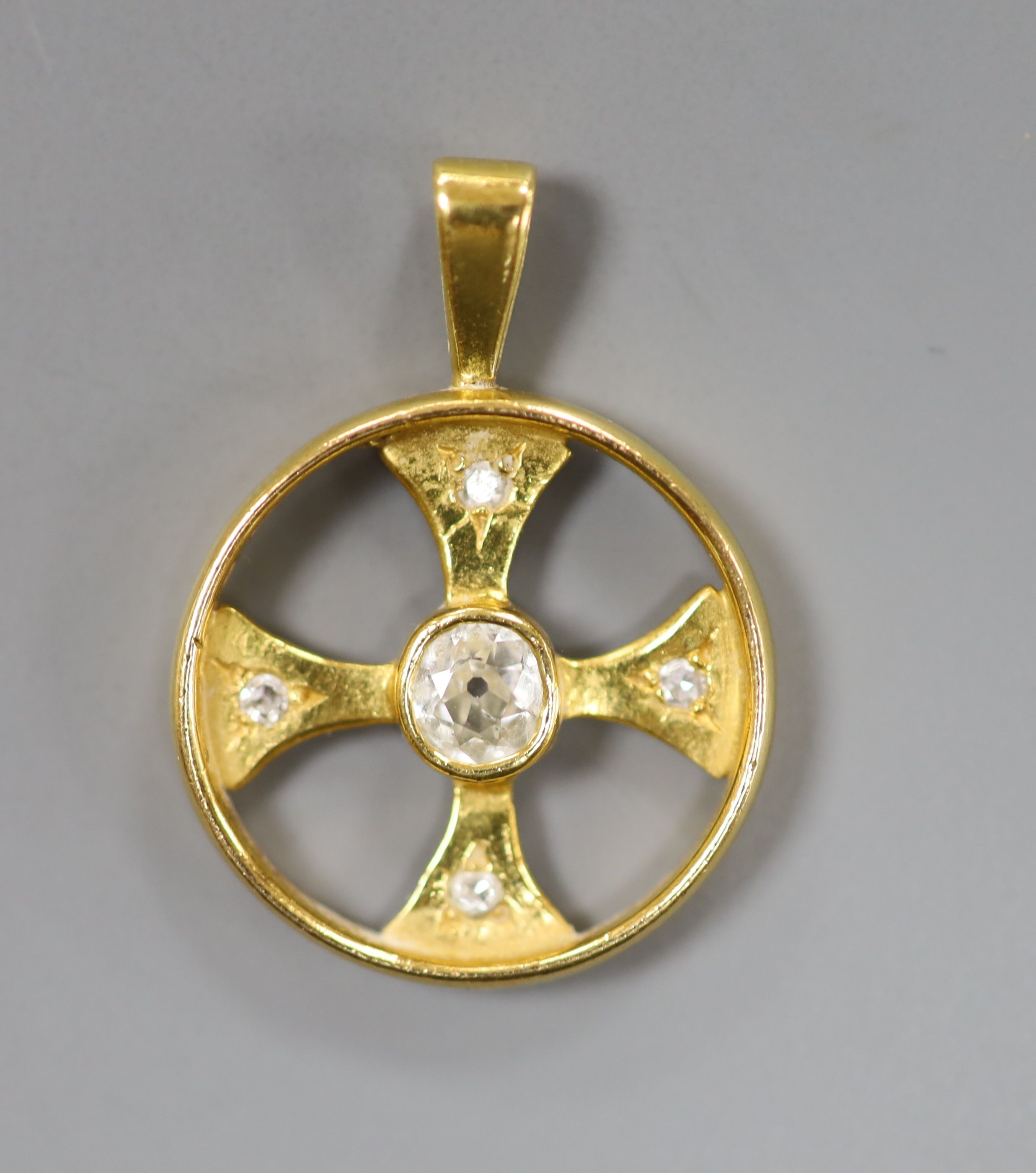 A 22ct gold and diamond set circular pendant (converted wedding band), overall 25mm, gross weight 3.6 grams